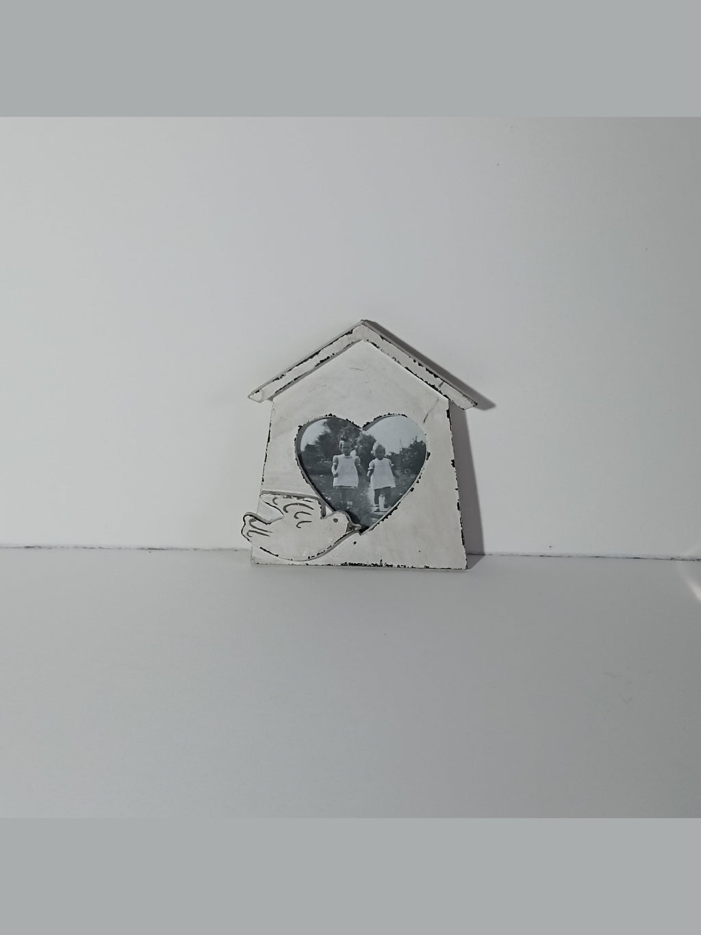 Portafoto da muro in legno con uccellino