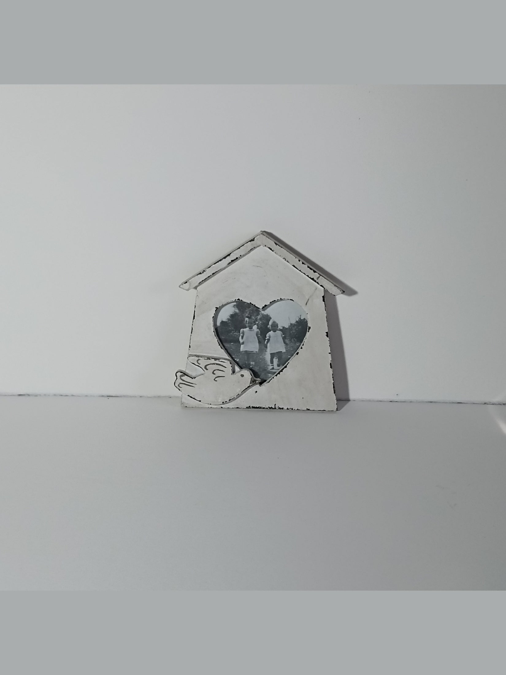 Portafoto da muro in legno con uccellino